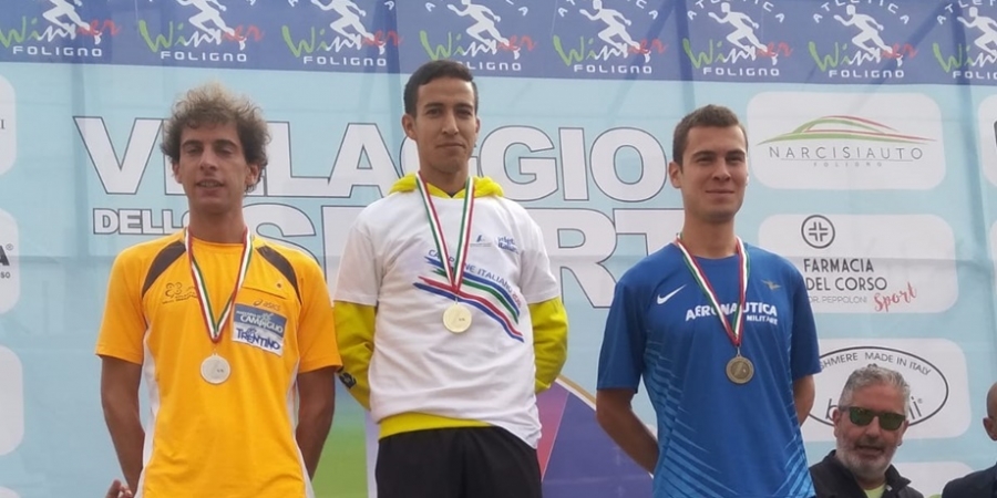 podio maschile, da sinistra Cesare Maestri, Ahmed El Mazoury, Alessandro Giacobazzi 