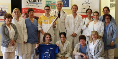 William, la torcia e lo staff medico diabetologia Forlì